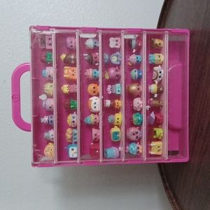 A portable shopkins carrier with mystery box's